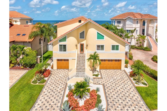 Experience unparalleled coastal grandeur at 5101 Westshore Drive