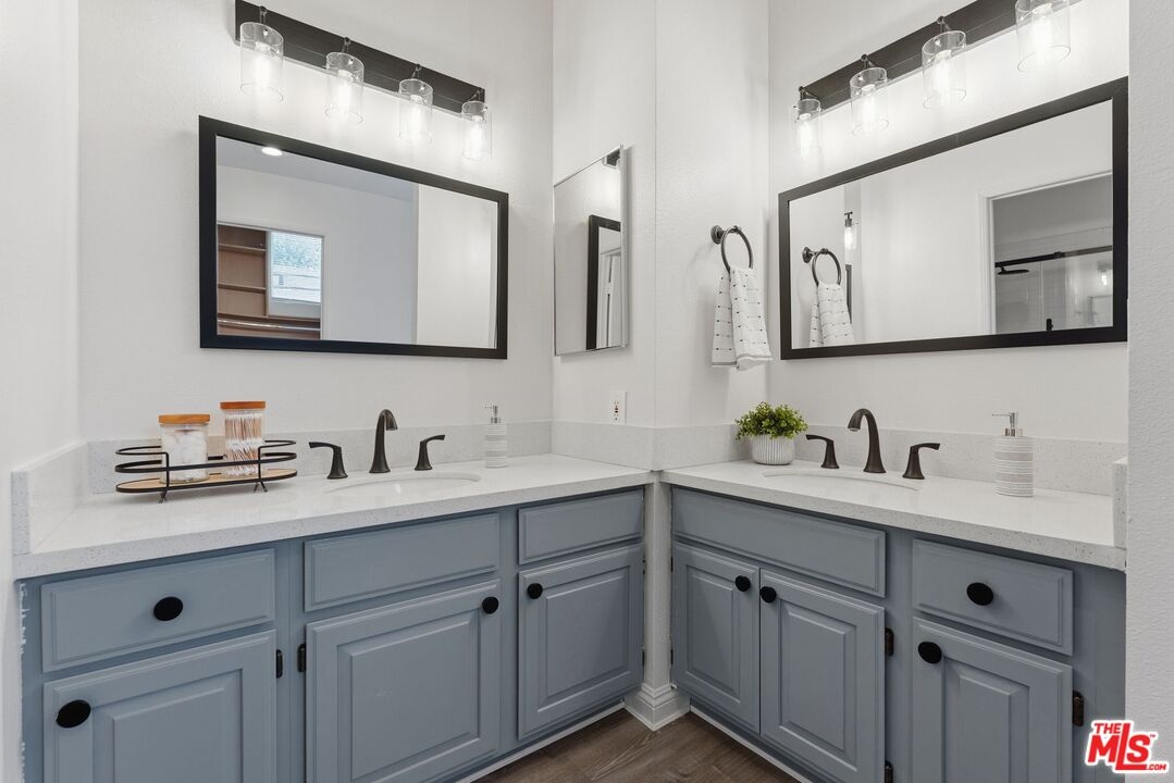 Bathroom featuring a dual vani