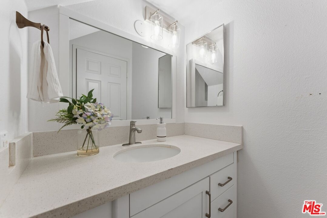Bathroom featuring a white van