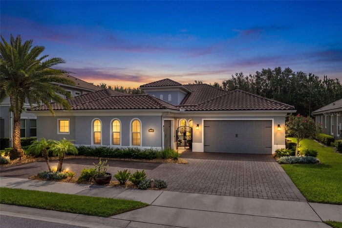 Stunning twilight elevation showcasing exceptional curb appeal.
