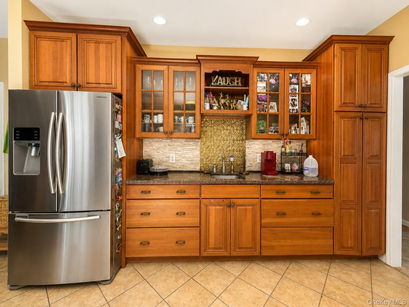 Separate Coffee Bar with cabinents, sink and Pantry cabinet