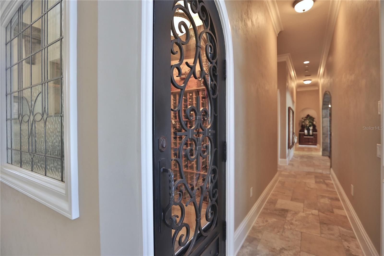 Hall to Wine Cellar, Office, Entertainment room and Owner's suite