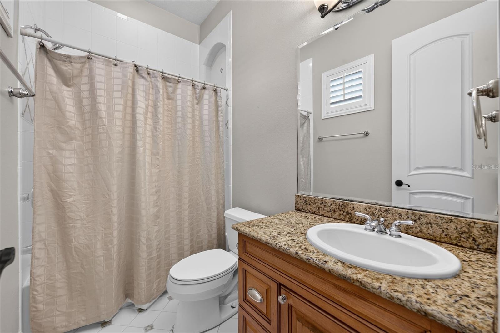 En suite bath with a tub