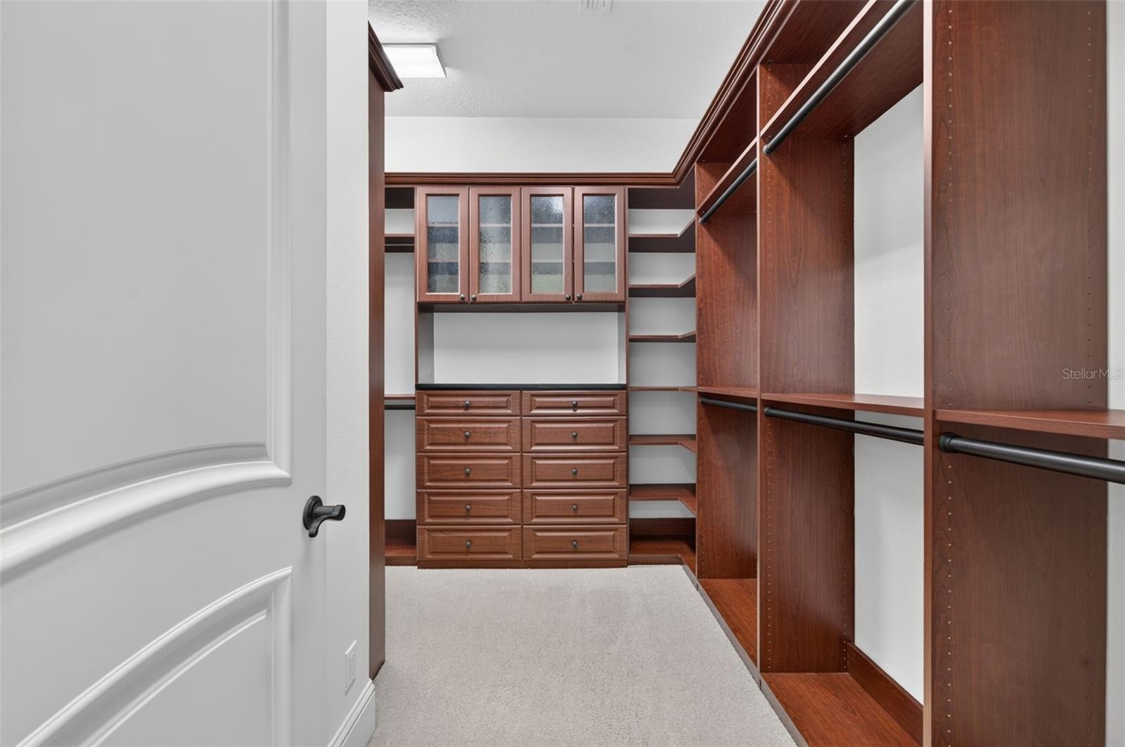 One of two custom closets in the primary suite