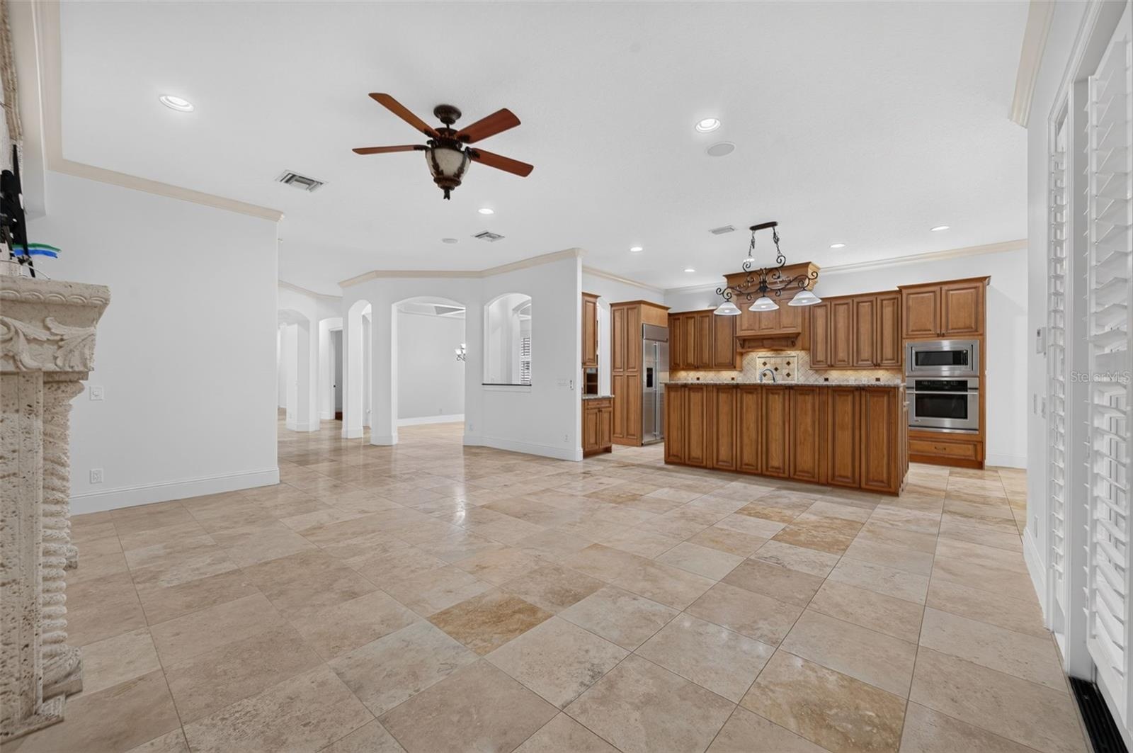 Kitchen flows seamlessly into the family room