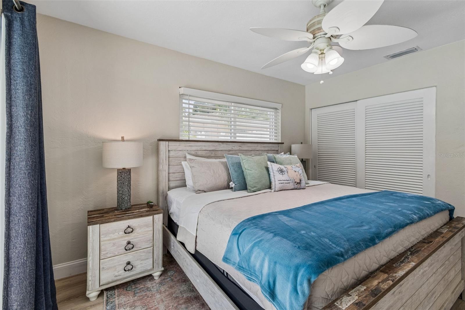 Bedroom 2 with sliding glass door to pool