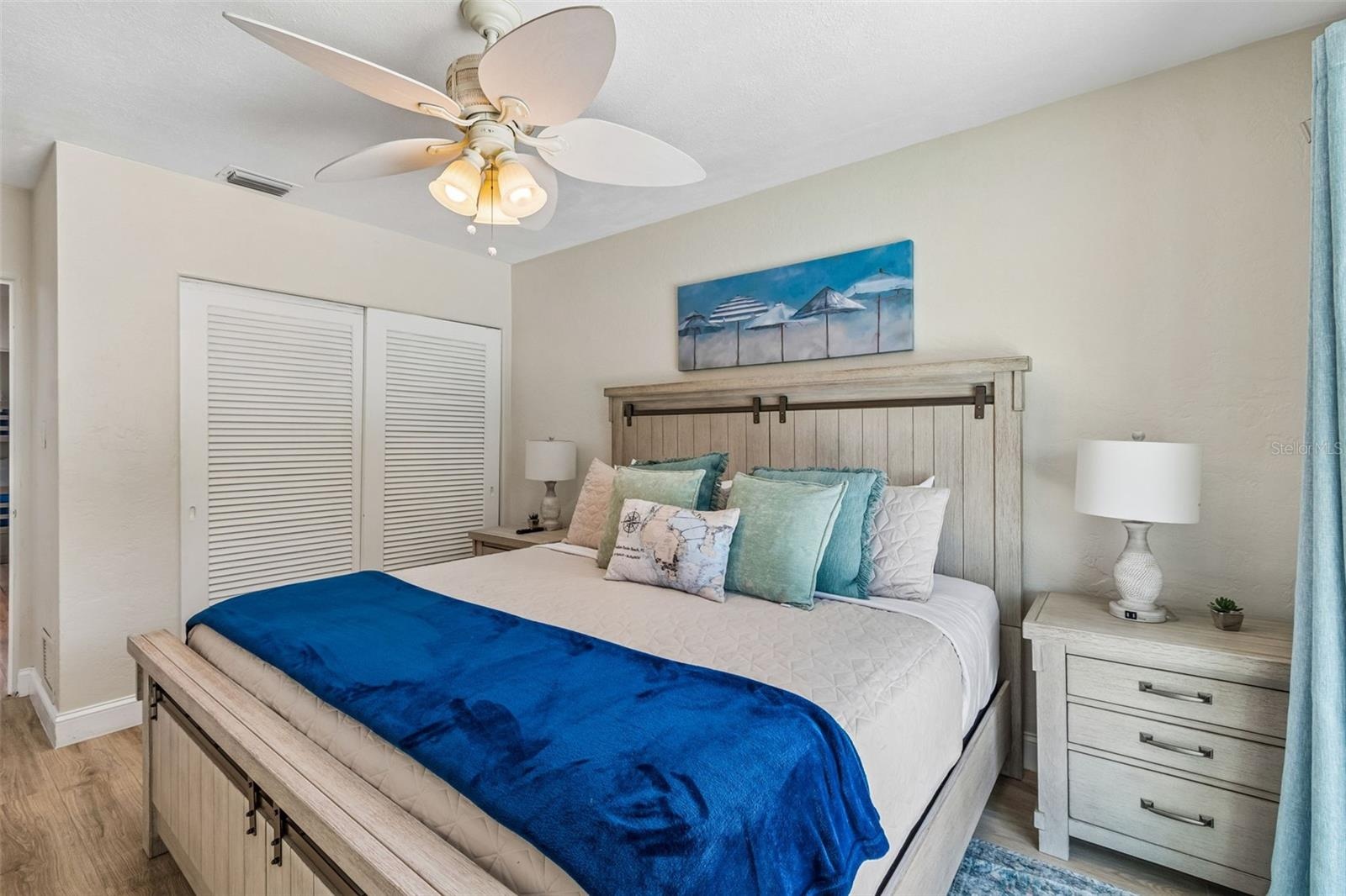 Bedroom 1 with sliding glass door to pool