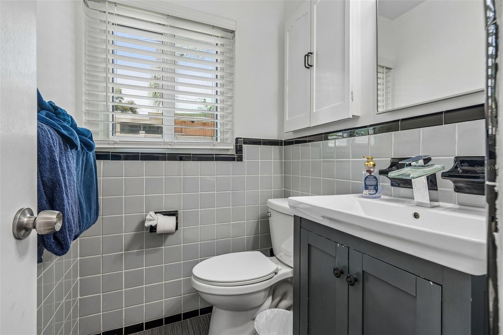 Half bathroom in hallway