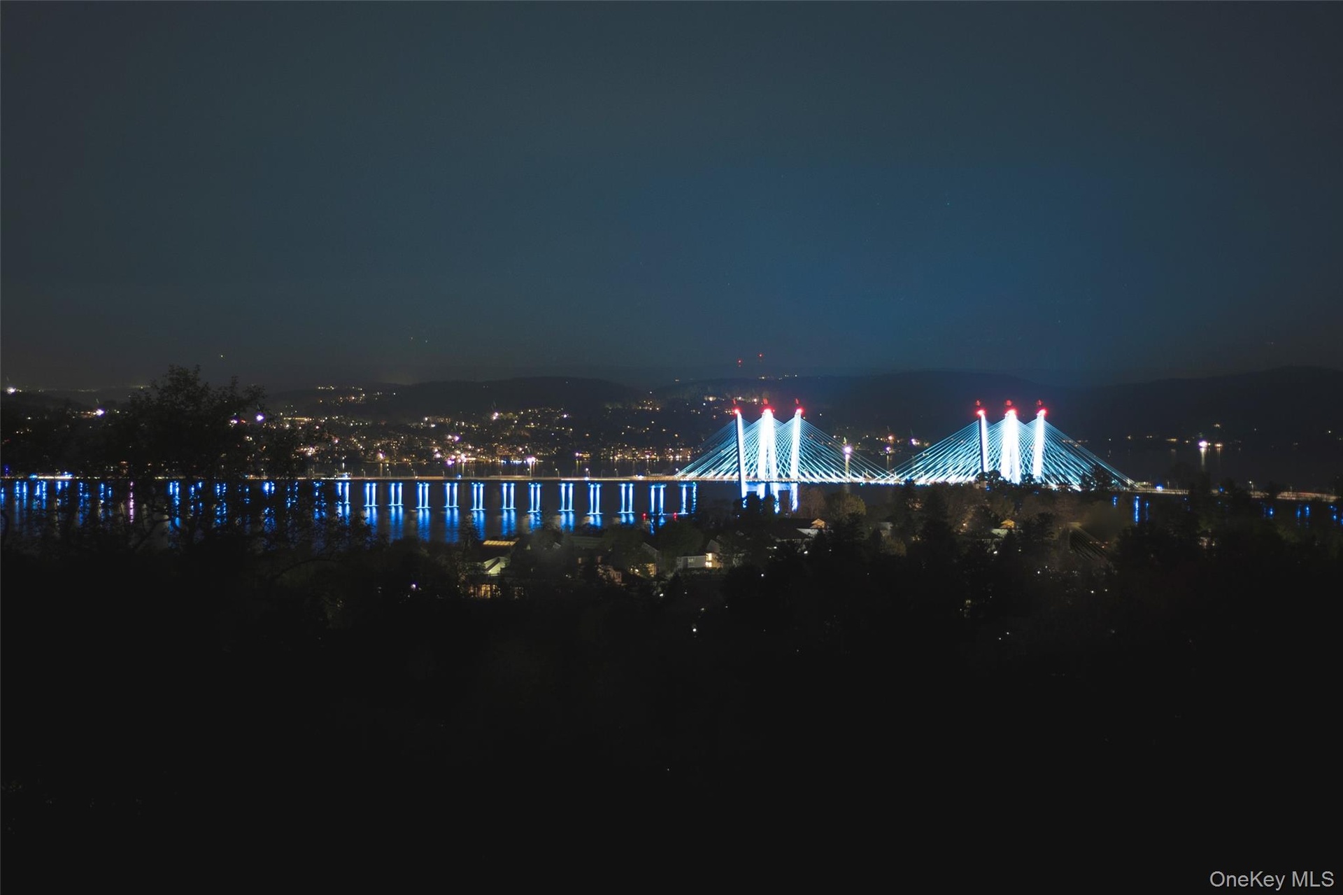 Mario Cuomo Bridge at night.