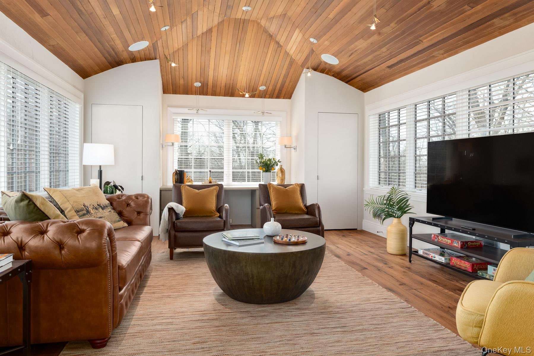 Expansive office or gracious guest bedroom with walk-in closet - plumbed for en-suite bath.