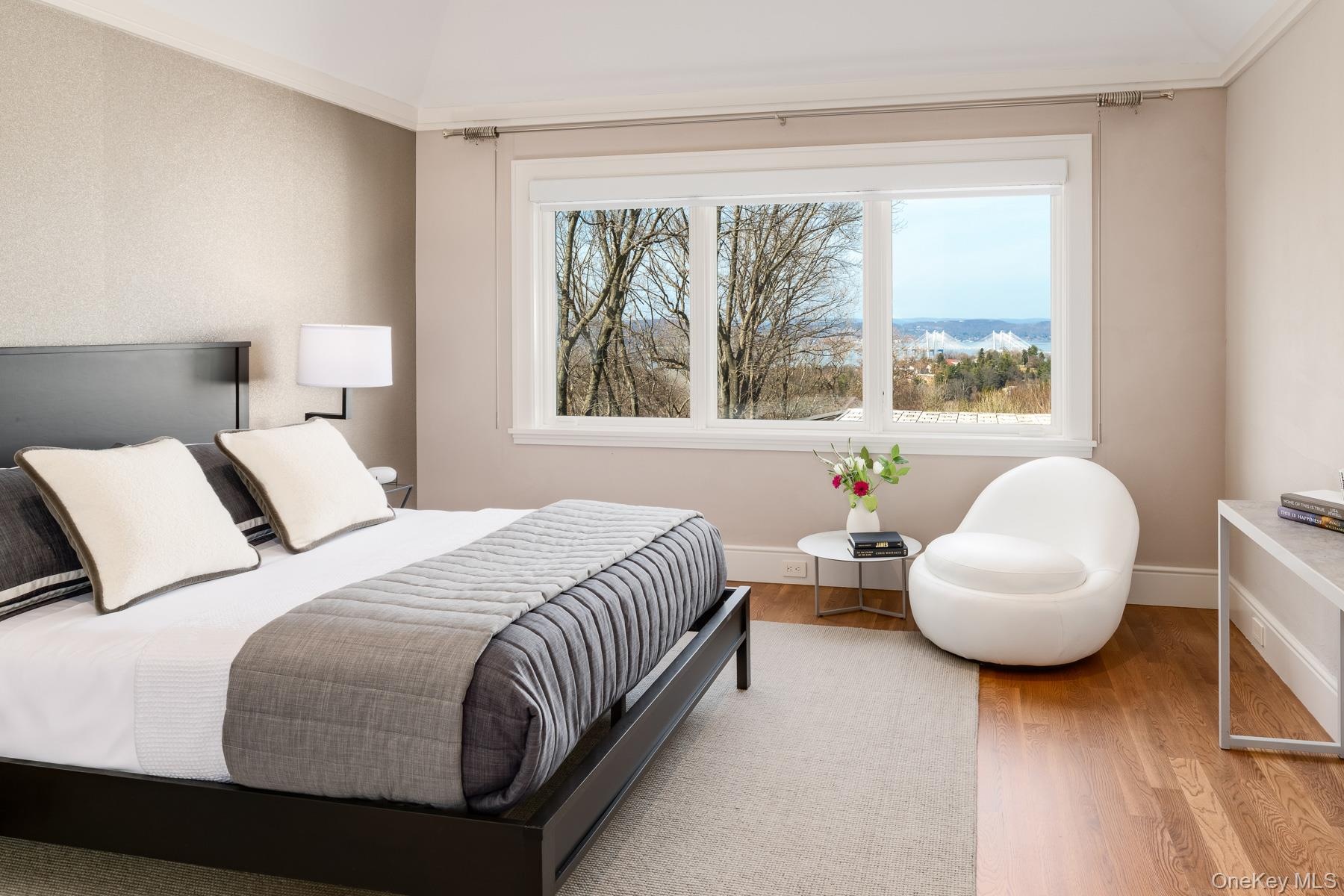 Bedroom with river views and en-suite bathroom.
