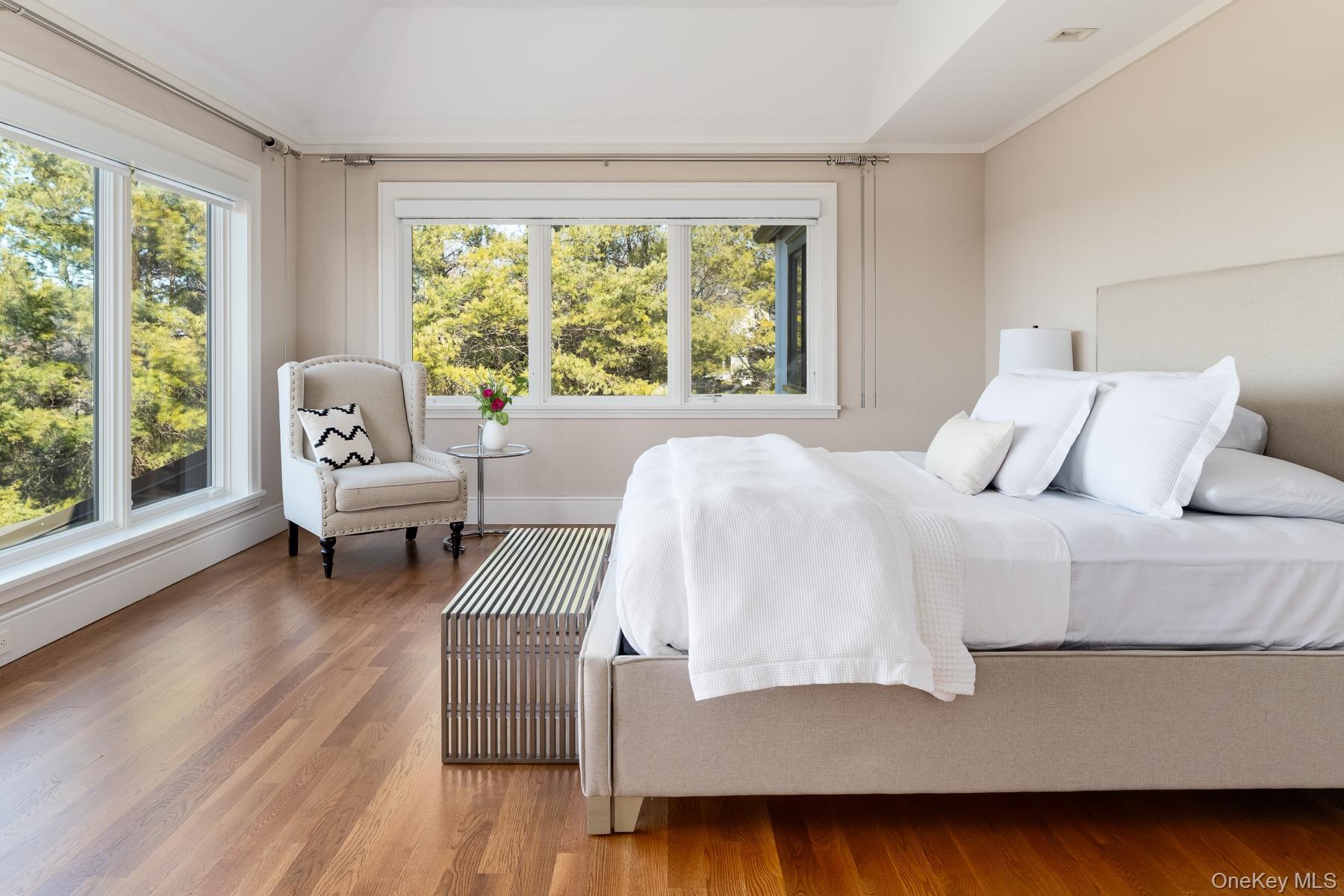 Peaceful primary bedroom - a private sanctuary.