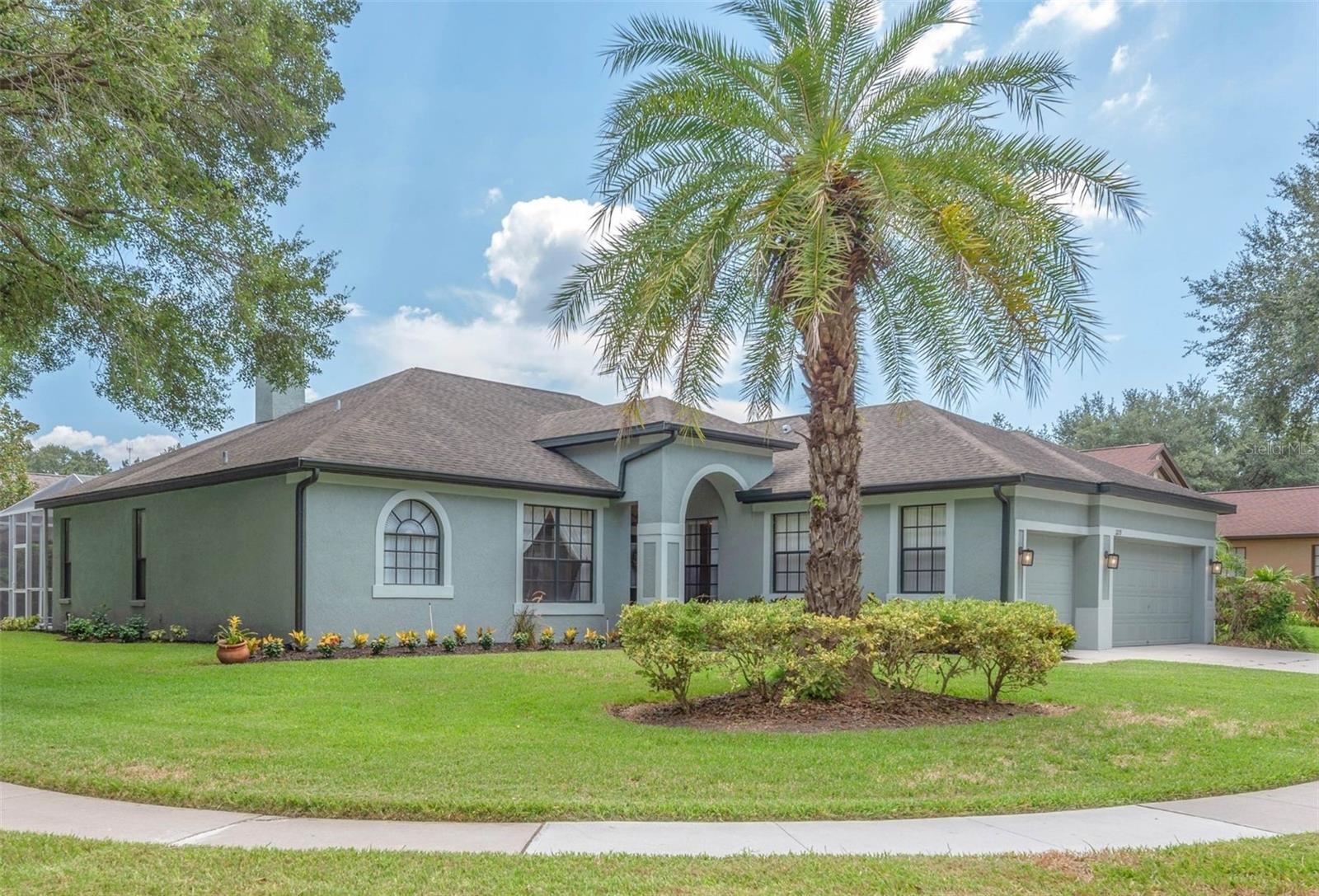 Nestled on a beautifully landscaped corner lot in the sought-after Somerset neighborhood.
