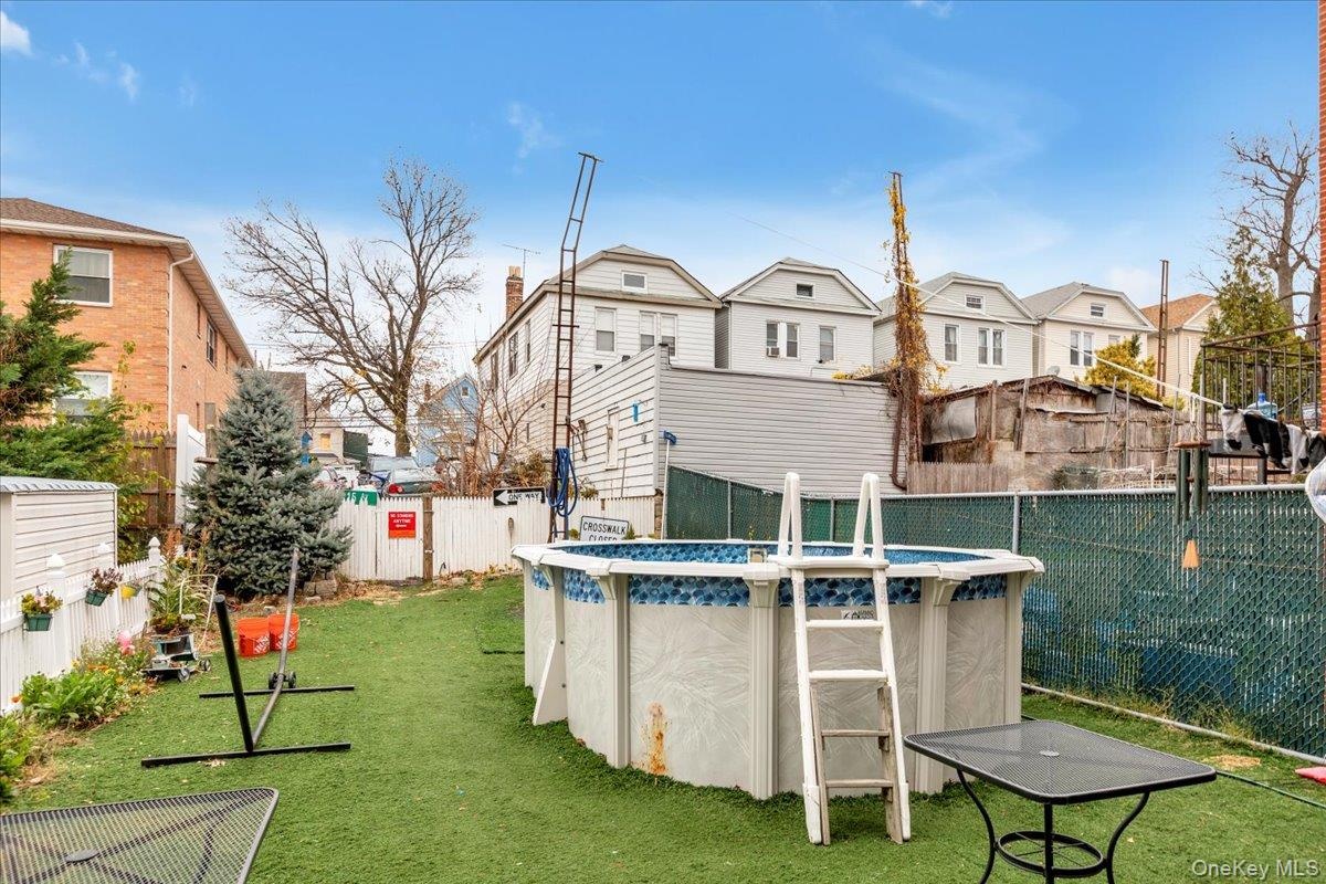 View of backyard with access from 14th Road.