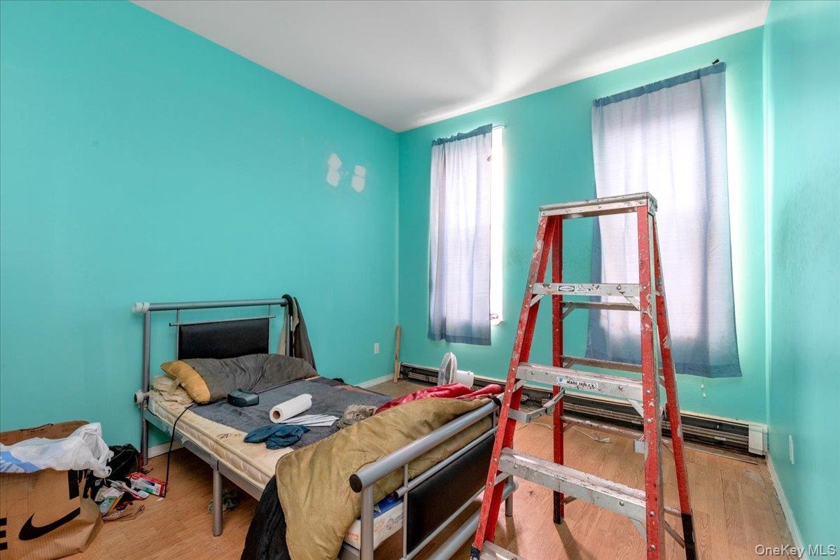 Bedroom featuring hardwood / wood-style floors