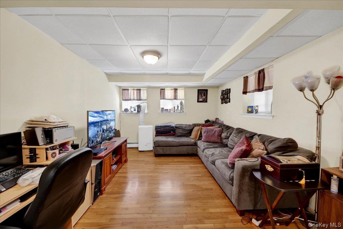 Living room with hardwood flooring in in-law