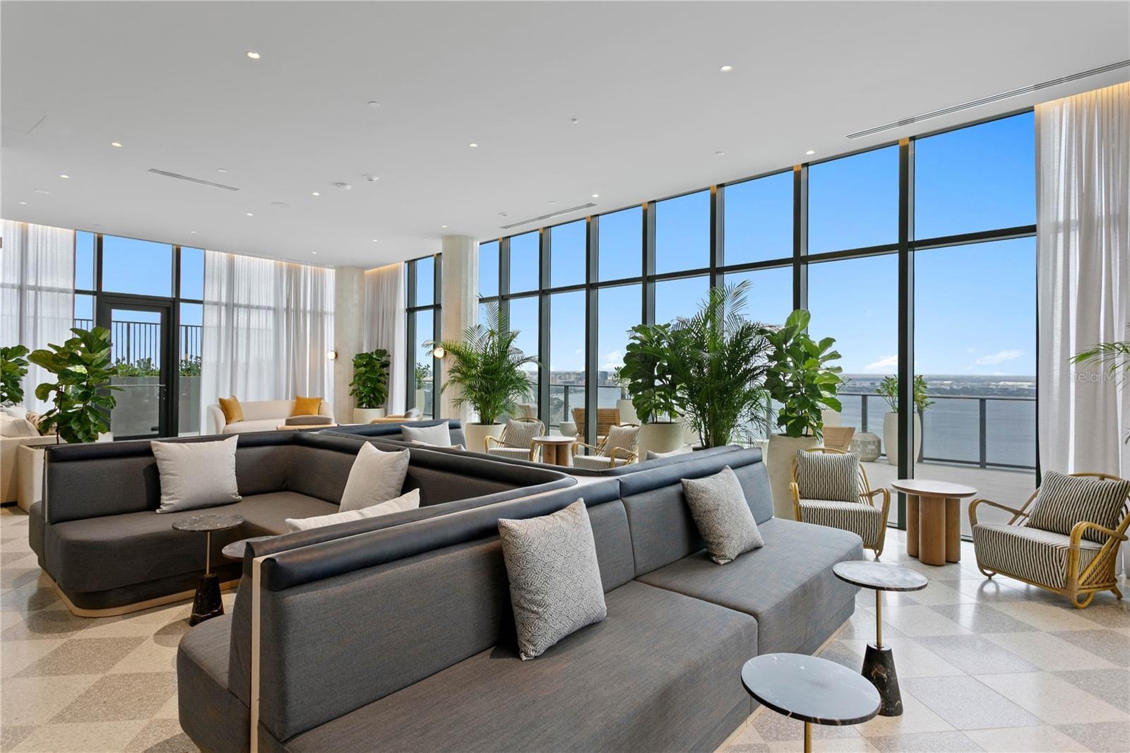 Elevated rooftop retreat with curated lounge areas and luxury hospitality services