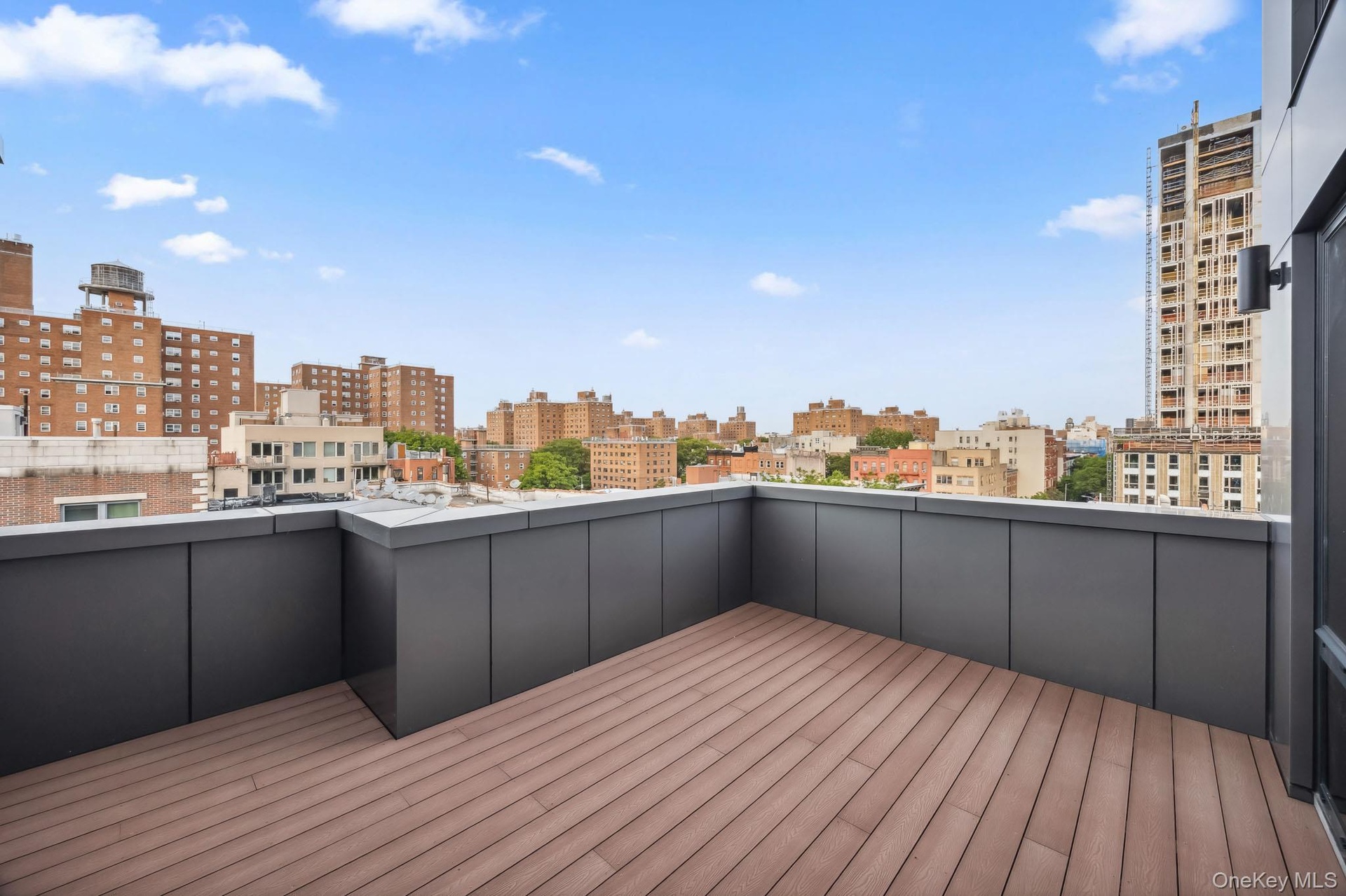 Wooden deck with a view of city
