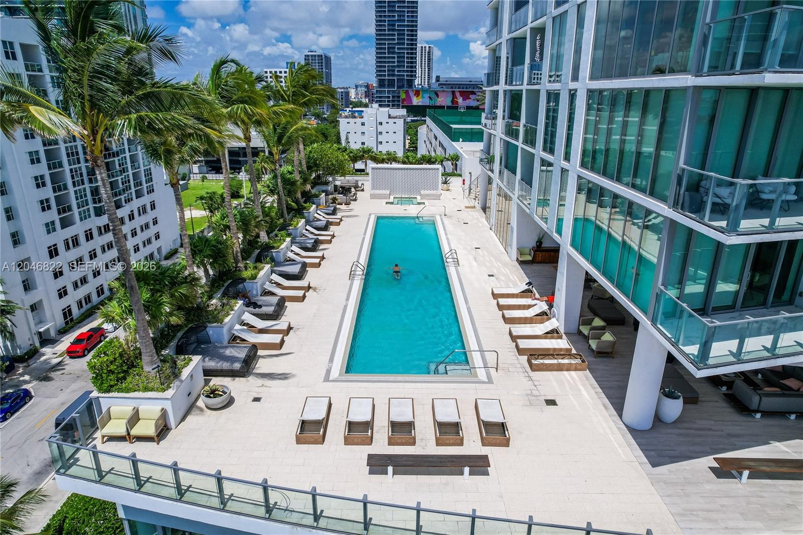 Resort-style bayfront pool deck at Biscayne Beach, Edgewater