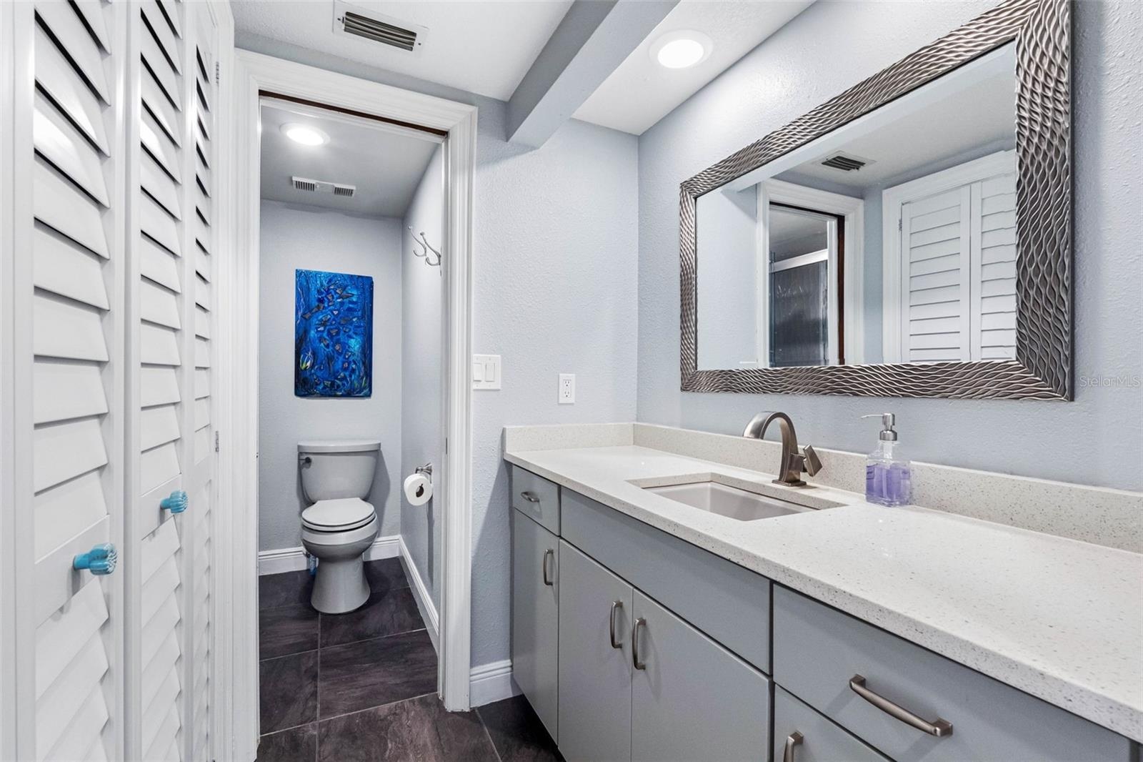 ... Full Bath on Main Level  Between Kitchen Area and 2nd Guest Bedroom.