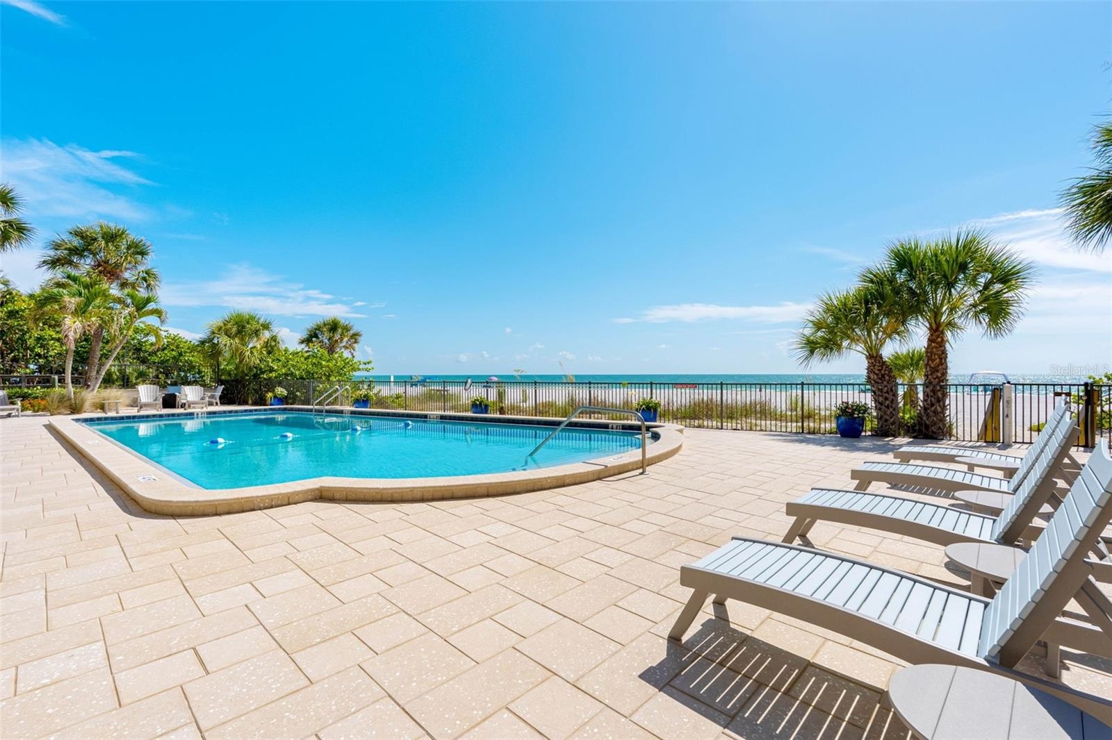 ... Large Heated Pool - Gulf Front - 700 West Enjoys a Large Pool Area with Numerous Lounging Areas.