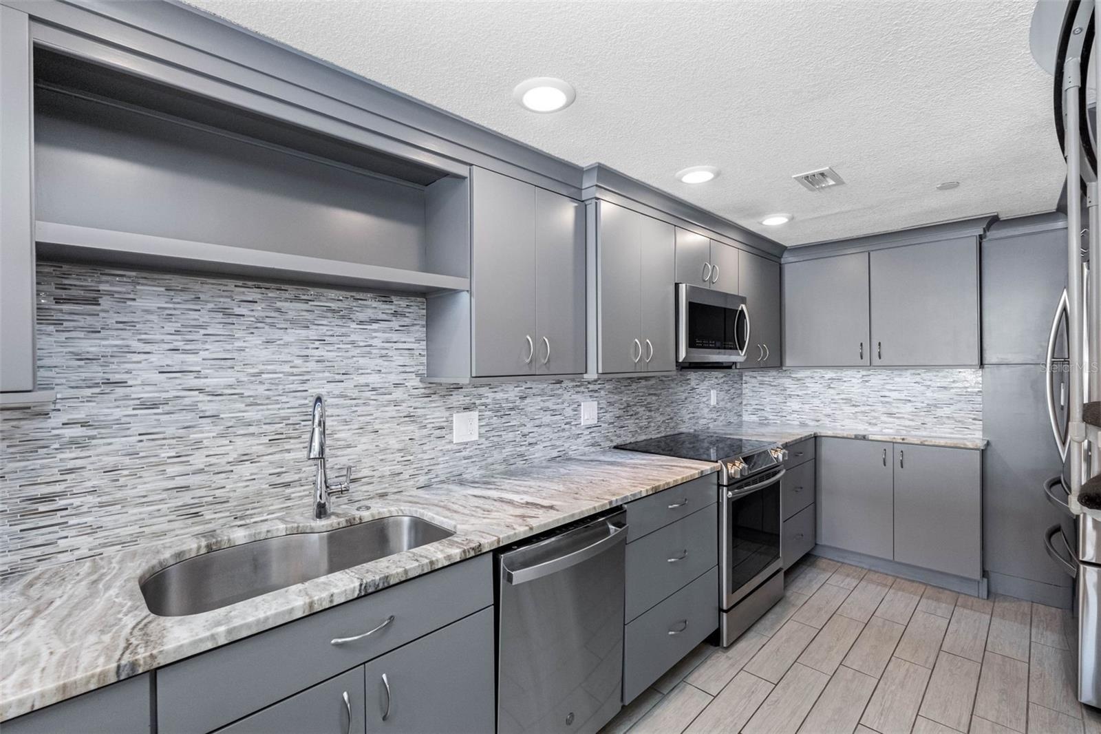 ... Plenty of Closet Space In Kitchen & Thru-out Entire Condo.