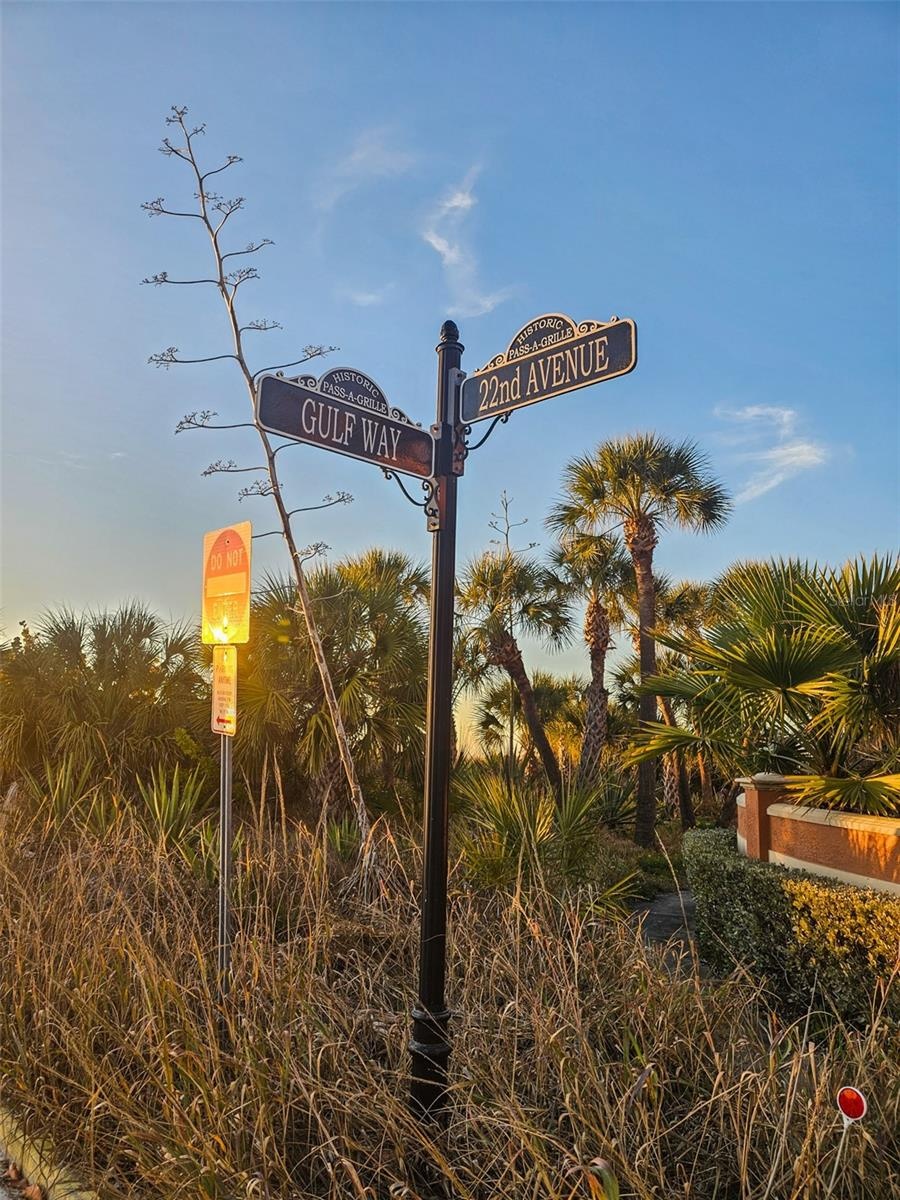 Street Sign At West Corner.