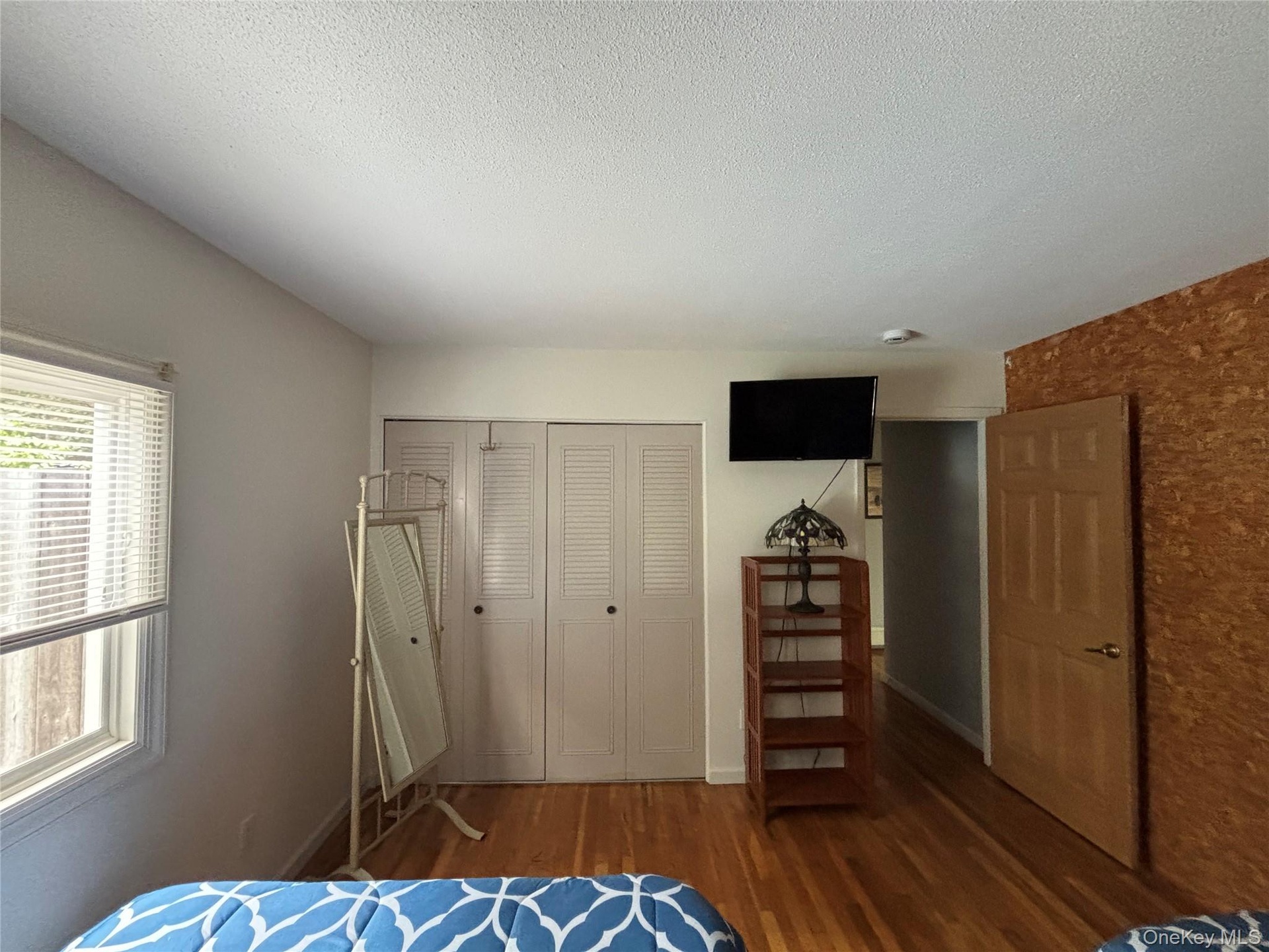 First Floor bedroom #2Full Bed, Closet, Dresser, Mirror, Smart TV , A/C Unit