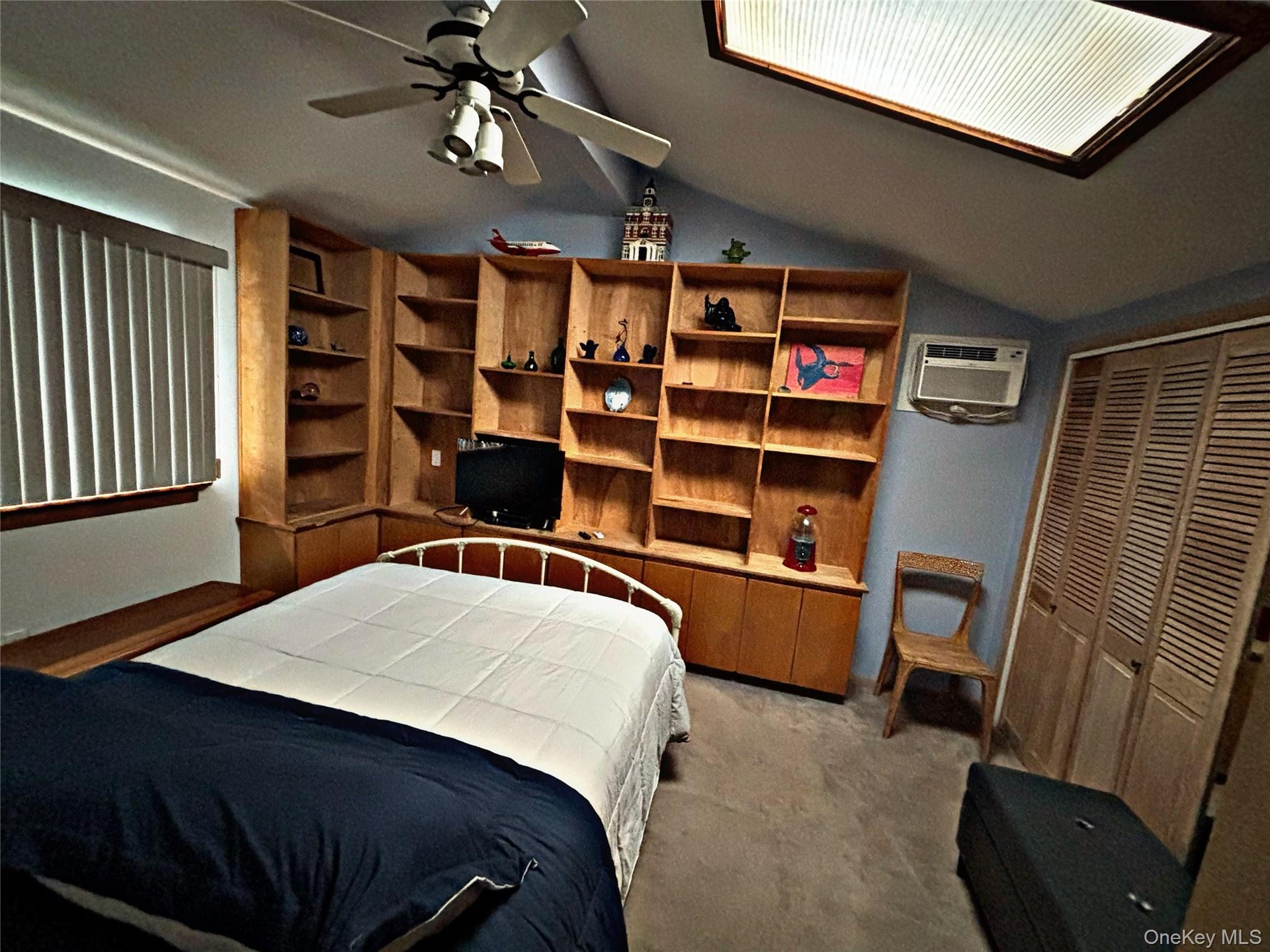 Bedroom #3- Upstairs with a Queen size bed, Closet, nightstand, chair.Vaulted ceilings, A/C Unit
