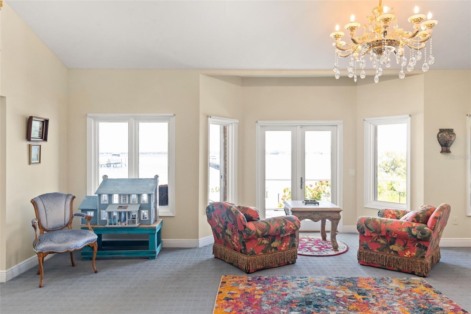 The luxurious first-floor master suite offers a separate sitting room, ideal for relaxation and privacy.