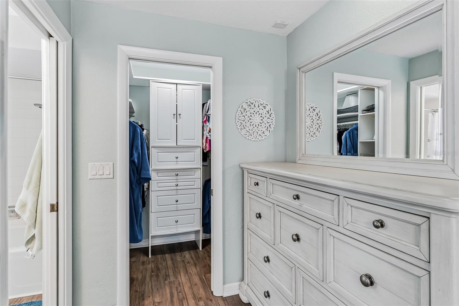 Small walk-in closet with plenty of room