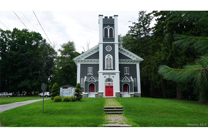 Front of Church. In between two residential homes sitting on 2.5 acres of land in Warwick, NY