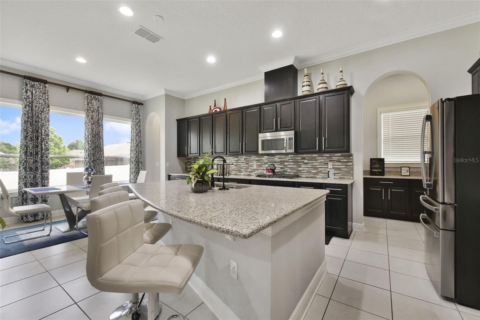 Kitchen with island and breakfast dining area