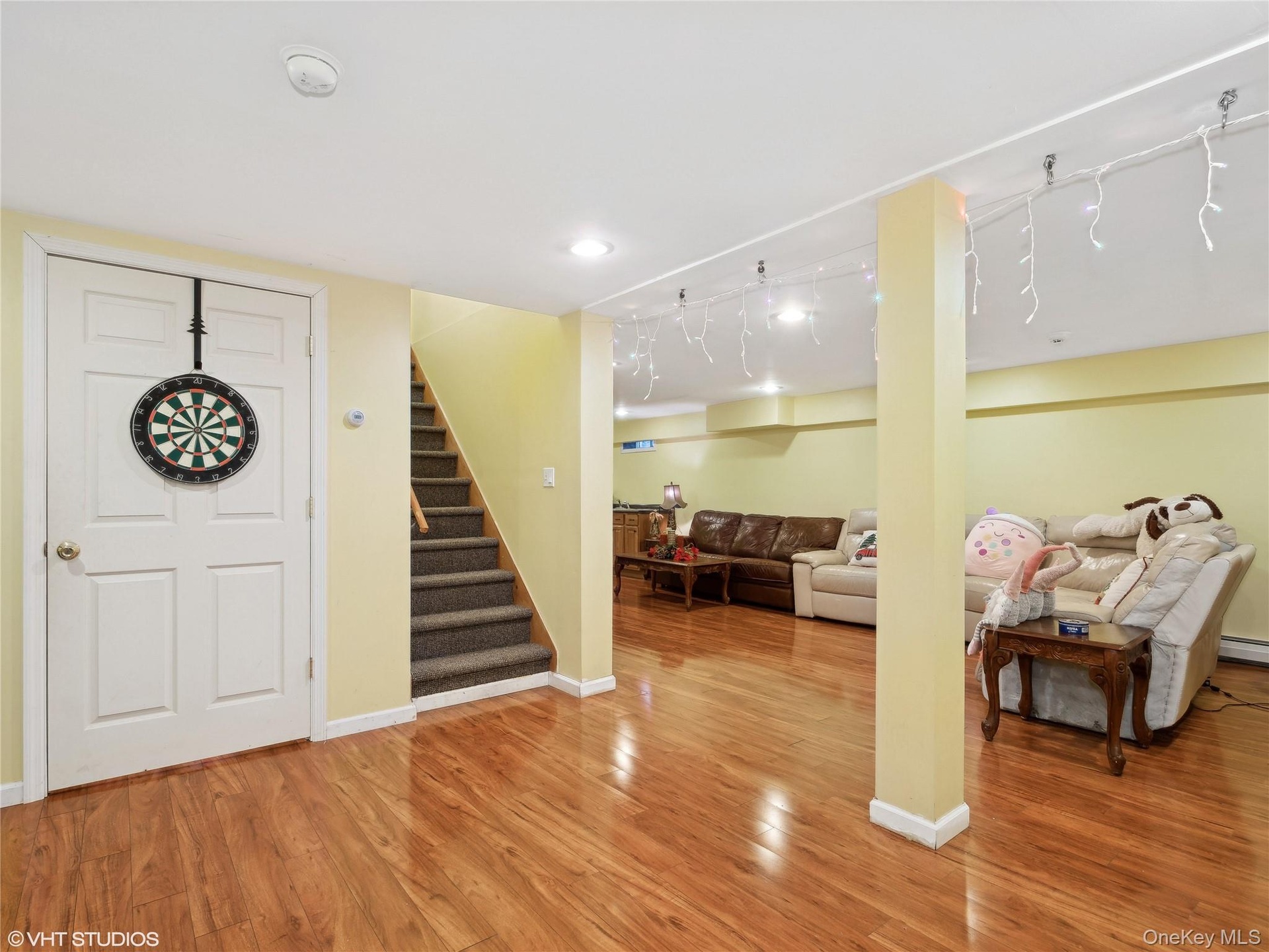 Entrance foyer featuring hardwood / wood-style floors