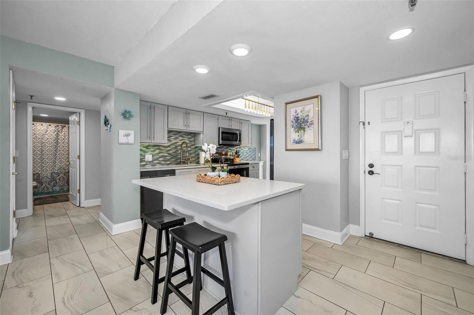 Contemporary Kitchen with Center Island and Buffet