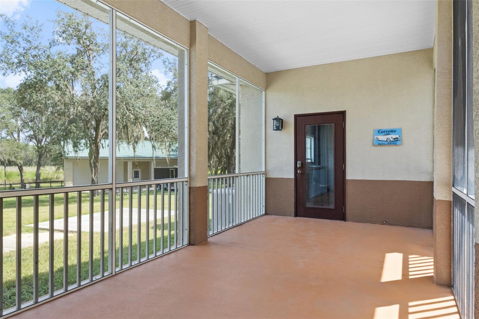 Breezeway, completely covered from house to garage. Additional 2000 sf 4 car detached garage in rear.