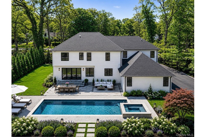 Photo is Digitally Enhanced - Property has no pool. Pool Credit will be given