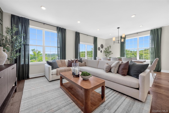 Open-concept living space featuring recessed lighting.