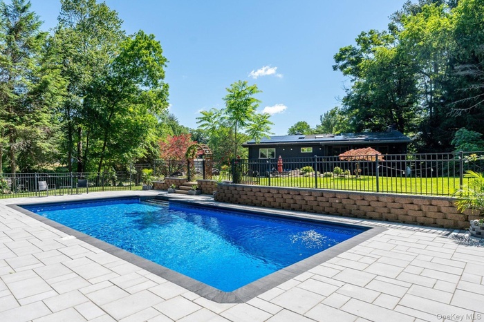 Back of Home with View of Pool