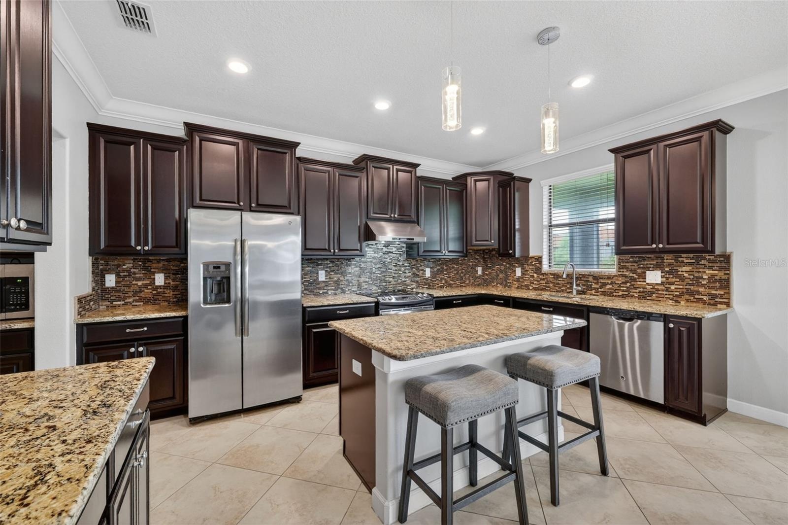 Window Overlooking the Serene Pond. Be creative with a Pass Thru to Summer Kitchen in the Future! Full Gourmet Kitchen with Crown Molding, Island, Pen