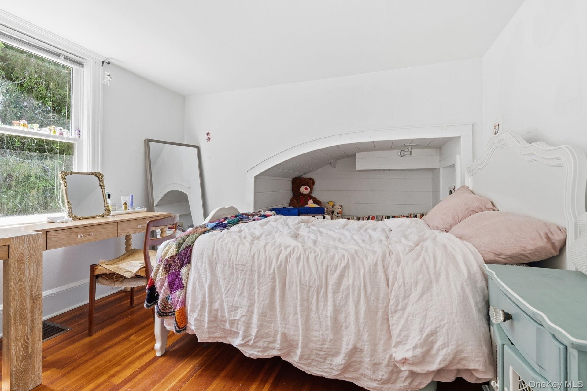 A spacious and versatile upstairs fourth bedroom offering comfort, flexibility, and abundant natural light.