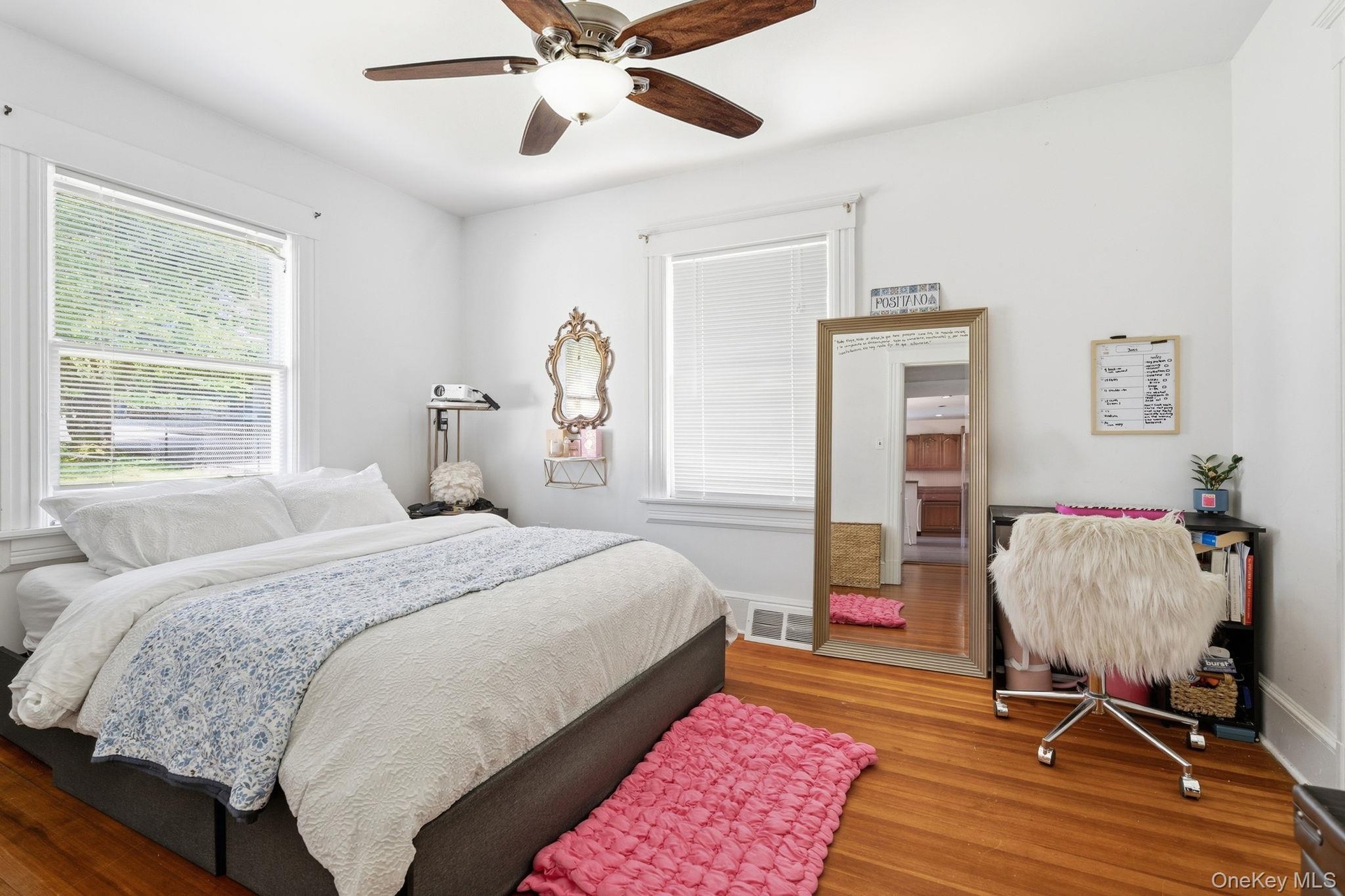 Tucked away from the main living areas, this secluded first-floor bedroom provides comfort, privacy, and flexibility.