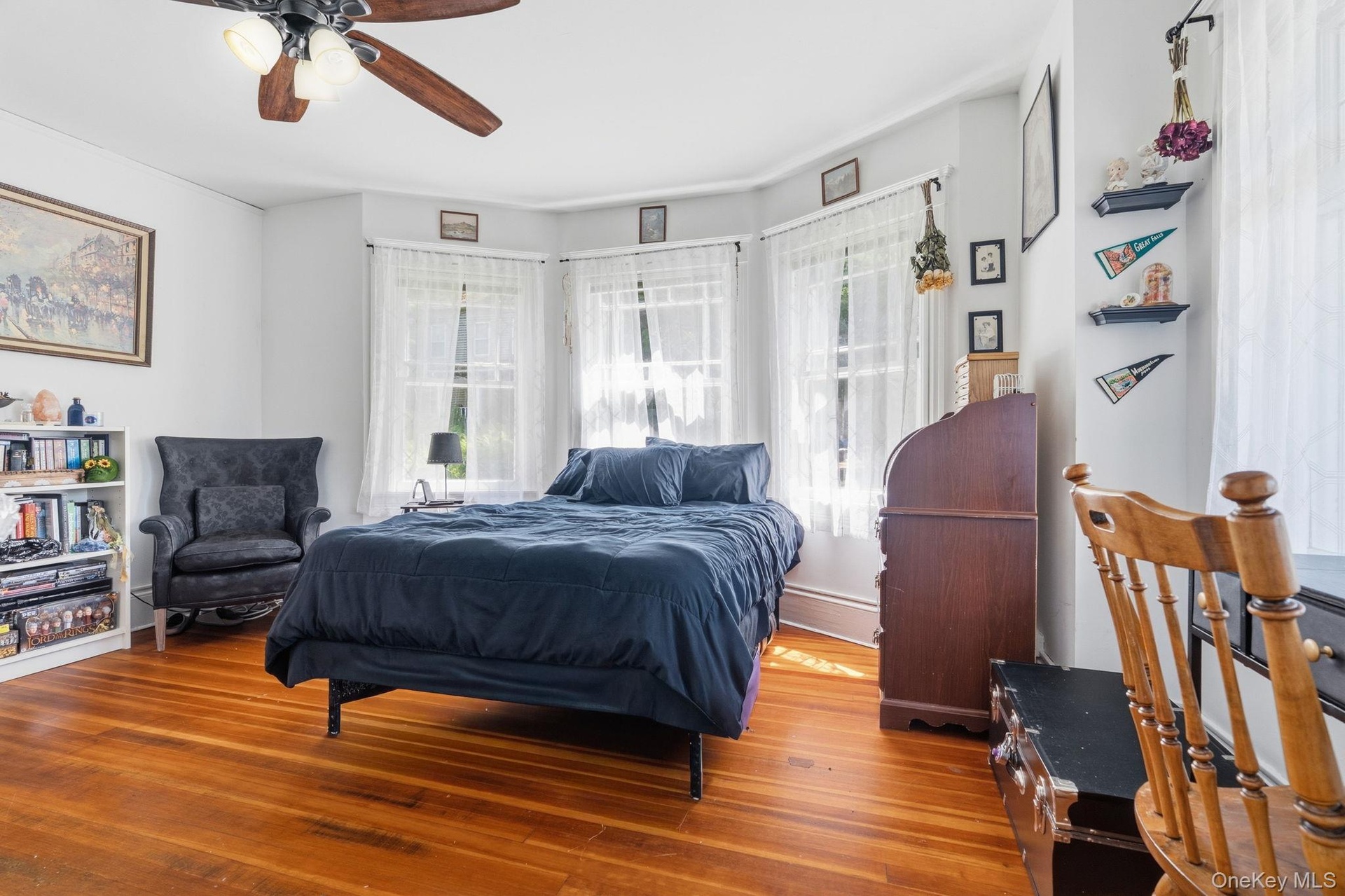 Thoughtfully proportioned with hardwood floors and room for a desk, creating the perfect blend of comfort and functionality.