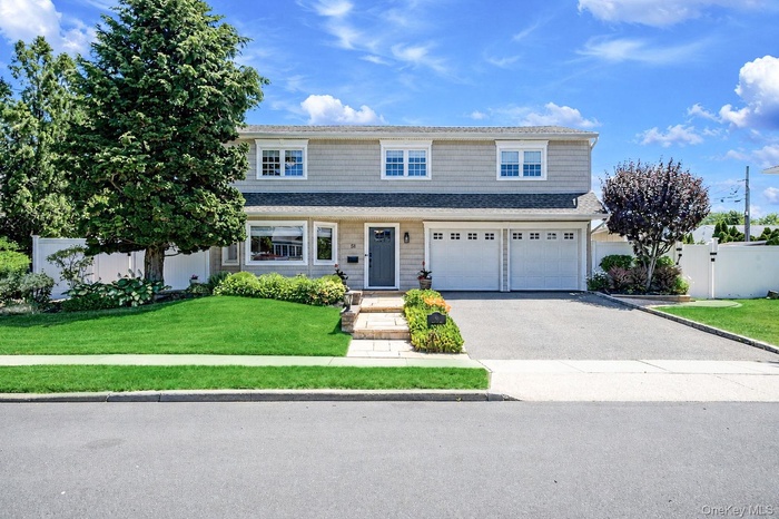 Expanded Colonial Splanch with 2 Car Garage, Great Curb Appeal, .23 Acres