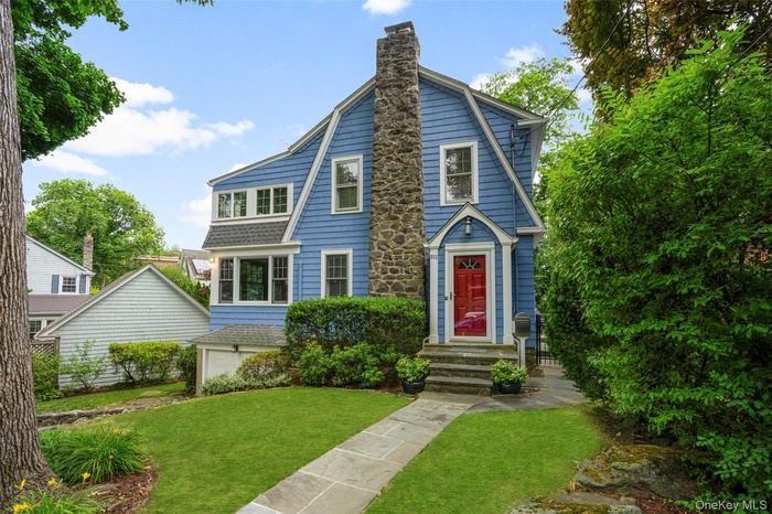 Charming Larchmont Colonial Offering Light-Filled Living and Exceptional Convenience.