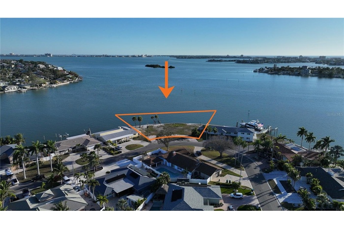 View of lot from North showing South-facing water frontage