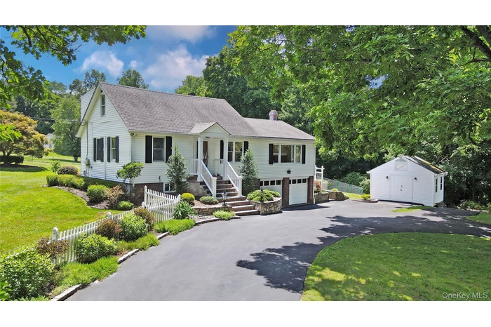 Amazing curb appeal as you follow the circular driveway up to the house