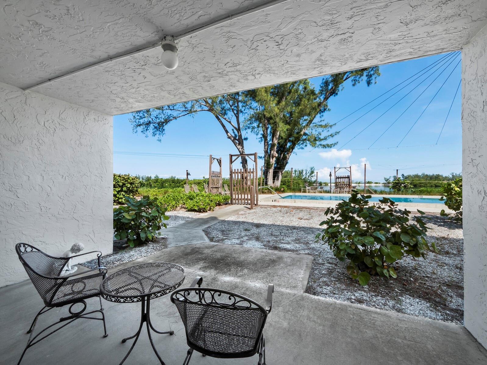 The ground level covered patio