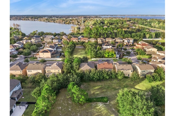 Rare privacy in Windermere — no rear neighbors, no front-facing neighbors, and no neighbor on the left side. Enjoy an open, peaceful setting with beau