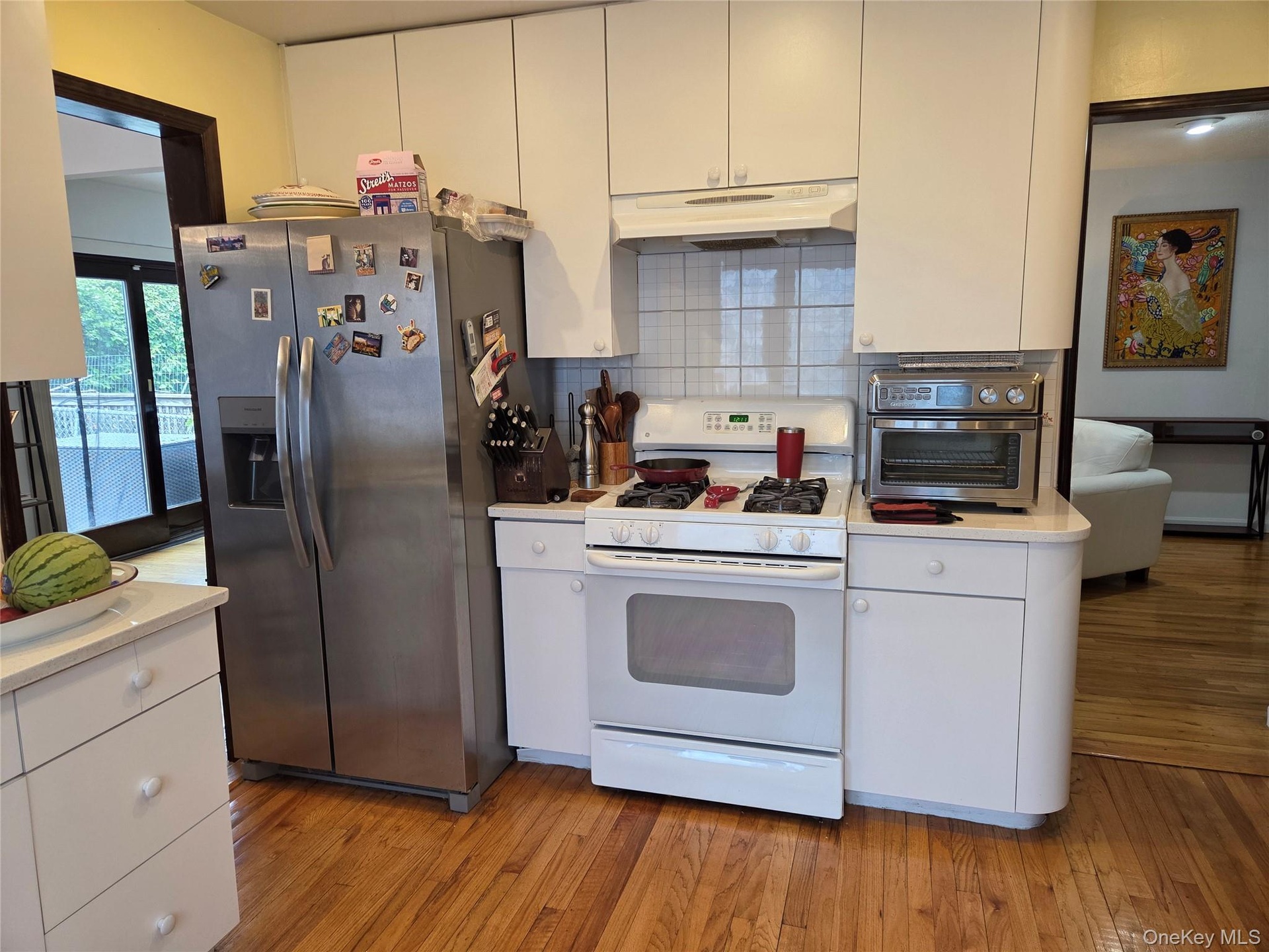 Upgraded kitchen with gas stove.